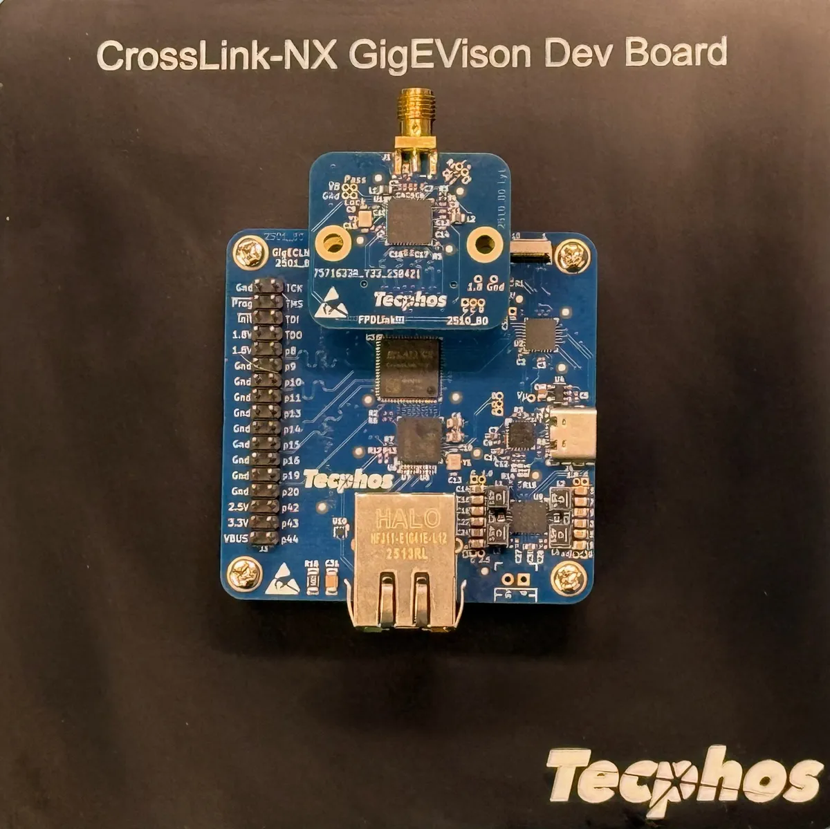 Tecphos CrossLink-NX Embedded Ethernet Video development board on black mounting plate