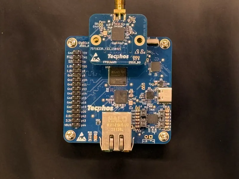 Tecphos CrossLink-NX Embedded Ethernet Video development board on black mounting plate